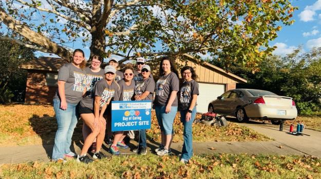 Day of Caring volunteers posing